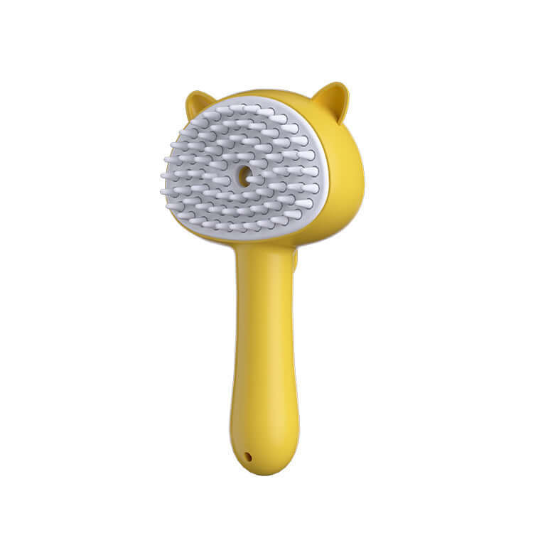 Cat grooming brush in yellow with ergonomic handle and self-cleaning design, ideal for reducing shedding and massaging pets.