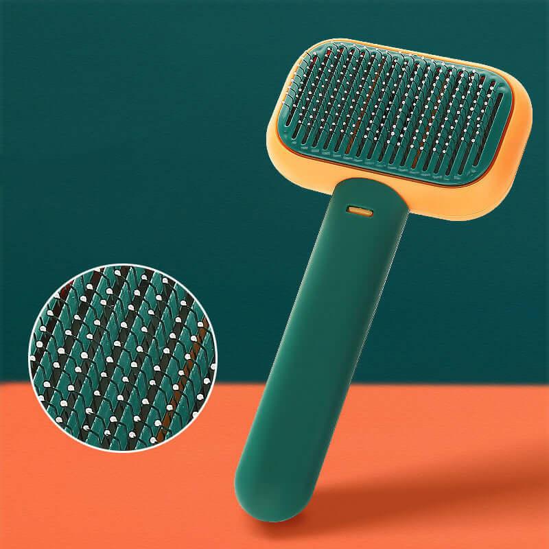 Open-knot brush grooming comb in smoke grey and orange, designed for effective hair detangling and massage.