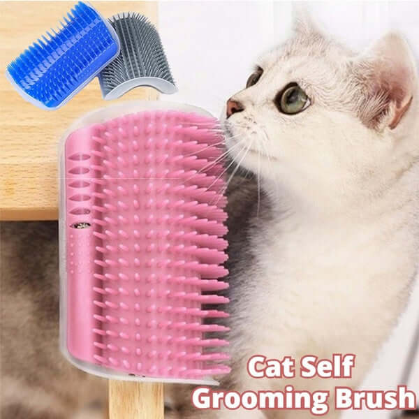 Pink cat self-grooming brush designed for gentle scratching and massage, mounted on a wall corner with cat nearby.