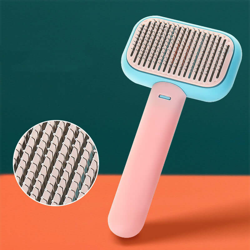 Open-knot brush grooming tool in pink and blue for effective pet hair management and knot prevention.