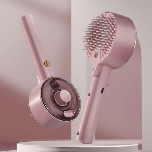 Dog and cat steam brush in pink, featuring UV sterilization and fine needle design for gentle grooming.